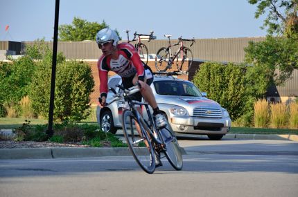 Cyclist and team car