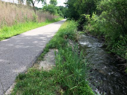 McHenry Prairie Trail with rushing water stream