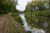 Dirt and stone trail surface along Hennepin Canal.