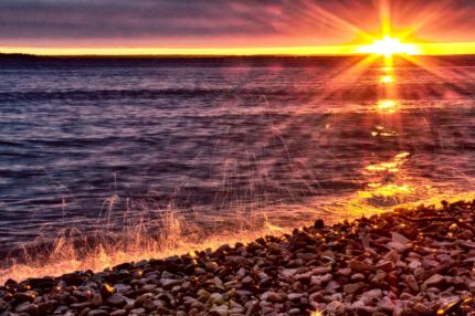 Light reflections of water at sunset