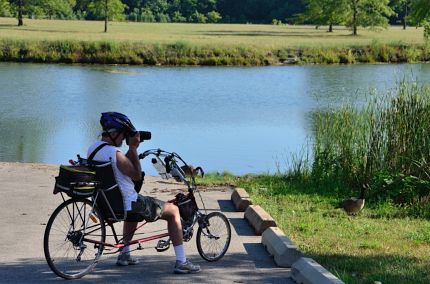 Recumbent rider taking photos at Big Bend Lake