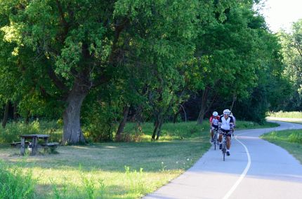 Three cyclists on northern part on NB Trail